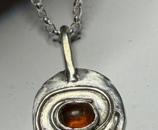Handmade sterling silver pendant with amber stone