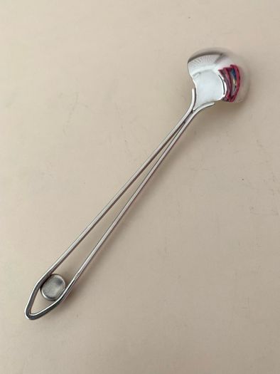 Antique coffee spoon with amber