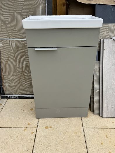 Narrow Sink Along With Vanity Unit And Pipes; Kitchen Sink And Quartz Worktop Unit With Wooden Inparts