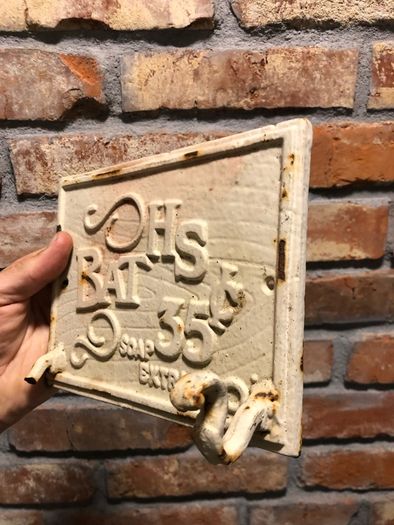 Cast iron wall hanger