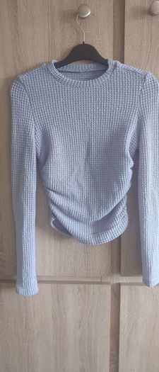 Dusky blue top fits Xs and s never worn