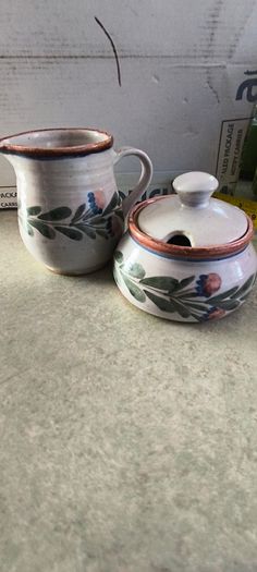 Sugar Bowl and Creamer, Hand Painted signed The Potter. po