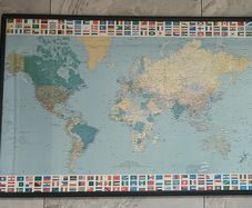 Framed Map of the World with Country Flags in black frame.  Dimensions 1005mm X 710mm.