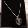 selection of homemade white metal necklaces Image 9