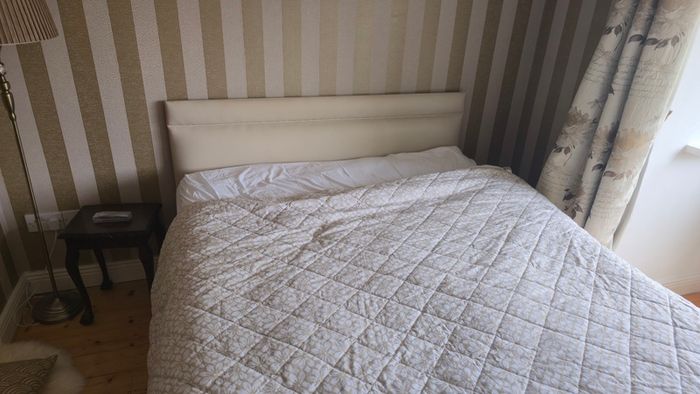 Double beds and kitchen seats