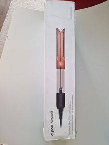 Hair straightener and dryer. Dyson airstrait