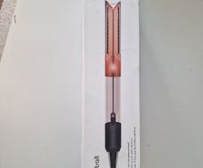 Hair straightener and dryer. Dyson airstrait