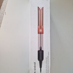 Hair straightener and dryer. Dyson airstrait