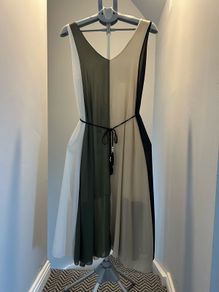 Never worn dress with tag. Large size .