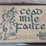 A vintage decorative wall plaque featuring a traditional Irish greeting. Image 6