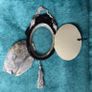 vintage-style oval picture frame in silver with a tassel and ribbon hanger Image 4