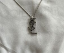 Authentic Yves Saint Laurent chain with logo pendant