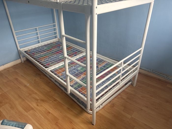 white metal bunk bed frame