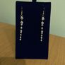 Gold tone sparkling earrings Image 2
