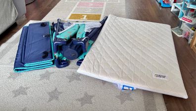 Travel cot with mattress