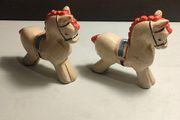 A pair of Early Twentieth Century Porcelain Carnival Horses