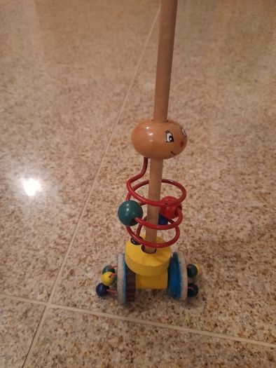 Wooden push along/ walk along clacking toy
