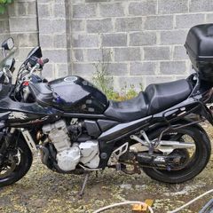 2007 black susuki bandit 1250 including luggage boxes .