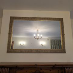 Mirror and matching gold light fittings