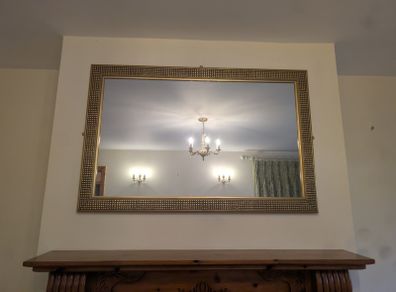 Mirror and matching gold light fittings