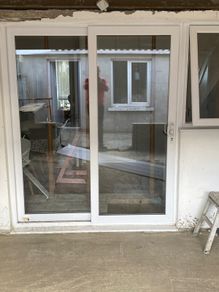 White uPVC sliding patio door and window