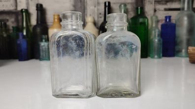 339 - Set of 2 Vintage Clear Glass Collectible Decorative Medicine Bottles