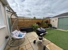 Custom timber garden fencing with integrated planters and bench Image 6