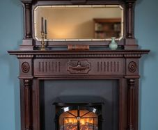 Classic Mahogany Fireplace Mantel with Built-In Mirror