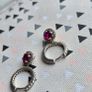 A beautiful pair of  sterling silver hoop earrings featuring small encrusted zircons and a dazzling ruby pink halo pendant. Image 3
