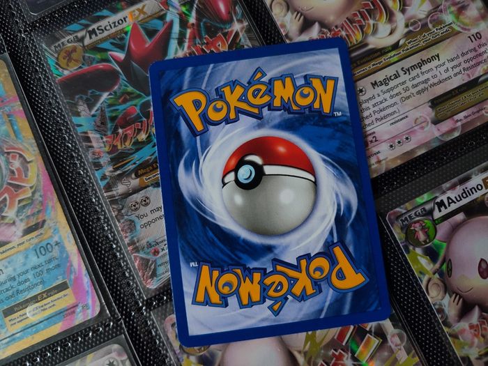 Ekans ! FIRST EDITION ! Rare Near Mint- Mint Condition ! from Team Rocket Set ! 2000 ! Pokemon Card !