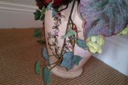 Artificial Dried Flower Arrangement in Pottery Urn.