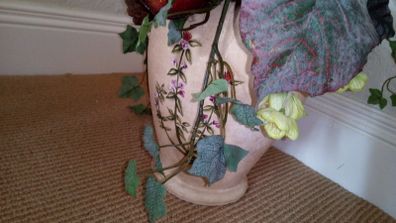 Artificial Dried Flower Arrangement in Pottery Urn.