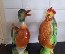 Lovely pair of Saint Clement ceramic pitchers