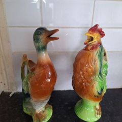 Lovely pair of Saint Clement ceramic pitchers