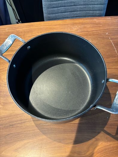 Set of All Clad pots and pans