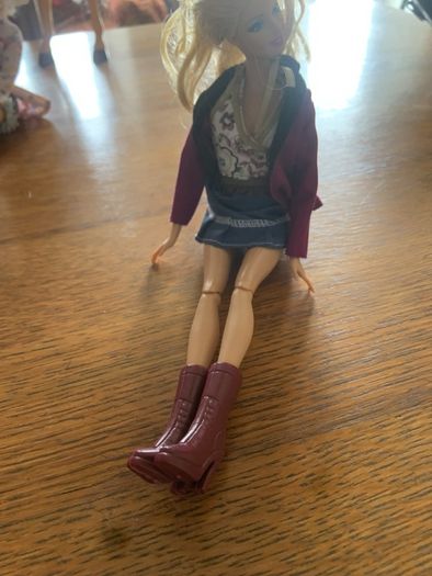 barbie with purple boots and jacket