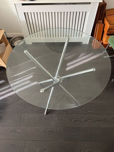 Glass table with two chairs