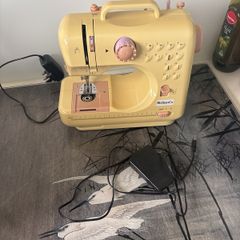 Childs sewing machine