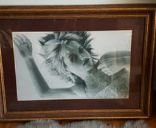 framed music print  Dolores O Riordan picture...reduced to sell