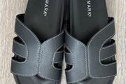 BRAND NEW Black sandals feature white contrast stitching and a molded footbed for comfort