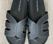 BRAND NEW Black sandals feature white contrast stitching and a molded footbed for comfort