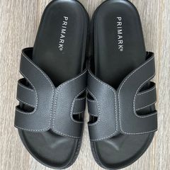 BRAND NEW Black sandals feature white contrast stitching and a molded footbed for comfort