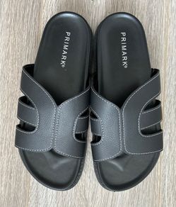 BRAND NEW Black sandals feature white contrast stitching and a molded footbed for comfort