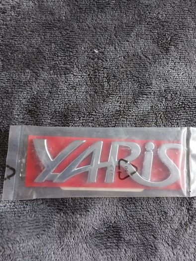 Genuine Toyota Yaris 1999-2005,part 75442-0d010 (plate, Back Door Name, No.2)