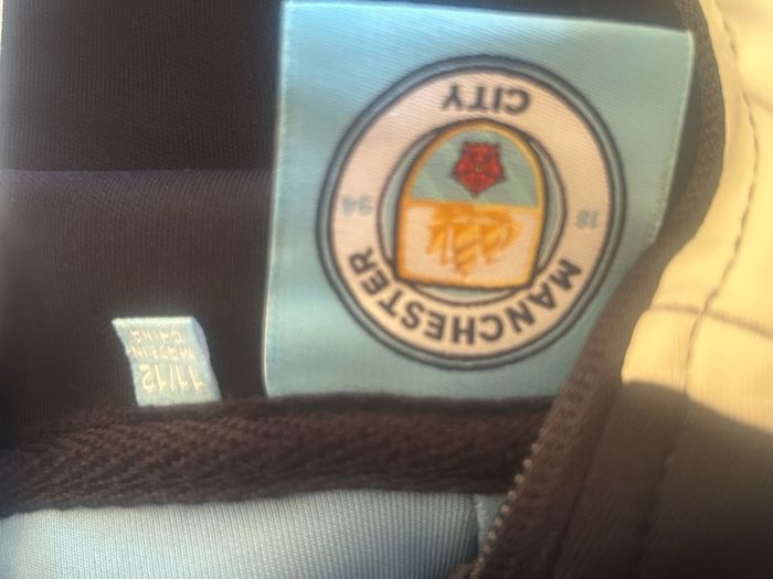 Man City tracksuit & tee shirt age 10-12 years