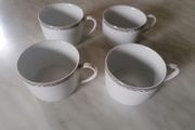 4 Royal Doulton Cups