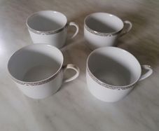4 Royal Doulton Cups