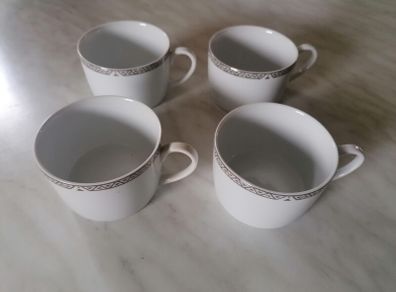 4 Royal Doulton Cups