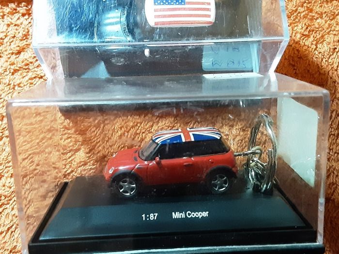 two clear boxed mini's