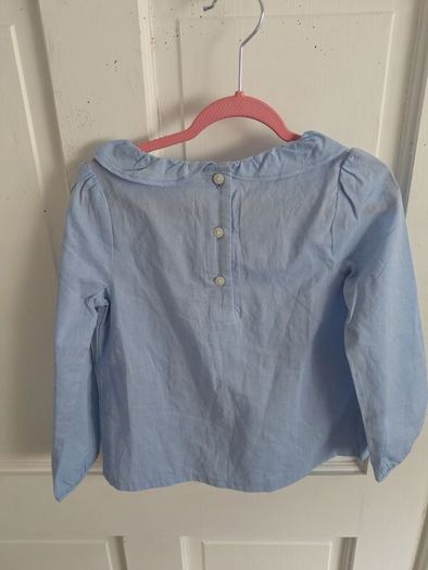 Blue top with tags